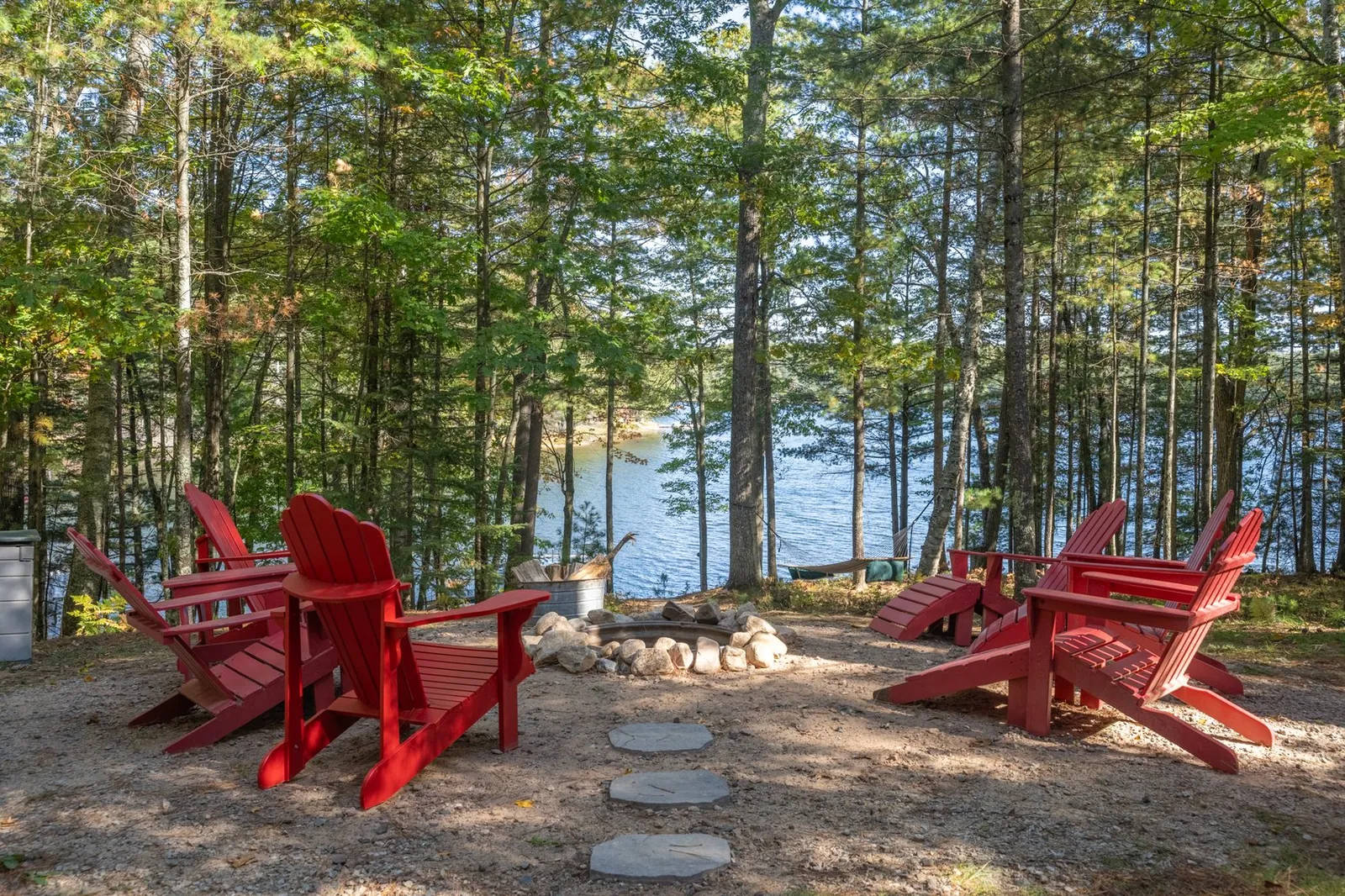 Lakeside firepit with Adirondack chairs